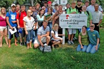 Jim Zaffiro with students in the organic garden