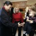 Chinese Vice President Xi Jinping greets Natalie Hansen Kimberley '00 and her eight-month-old son Austin. Looking on is her mother-in-law Martha Kimberley.
