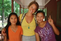 Sara Crippen '11 helps care for refugee children Htay Htay Aung and Cho Thin at Jubilee Farms in Georgia.