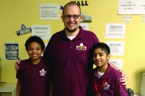 Justin Tiarks '06 tells his students that he will be at St. Paul City School until he is "old and gray."