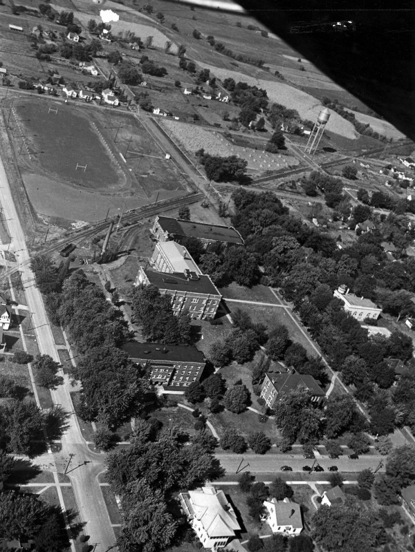 Railroad tracks ran through campus until the late 1990s, making a valid excuse for tardiness to class: “I got caught by the train.” This photo shows campus before Geisler Library, the Peace Mall or the Pond became hallmarks of Central.