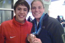 Sarah Newman ’01 (right) with JR Celski, U.S. Short Track Speedskating Olympian, at the 2010 Vancouver Olympics.