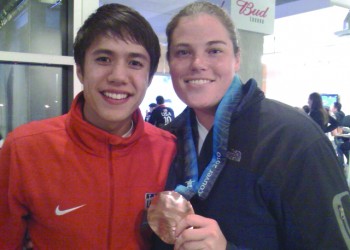 Sarah Newman ’01 (right) with JR Celski, U.S. Short Track Speedskating Olympian, at the 2010 Vancouver Olympics.